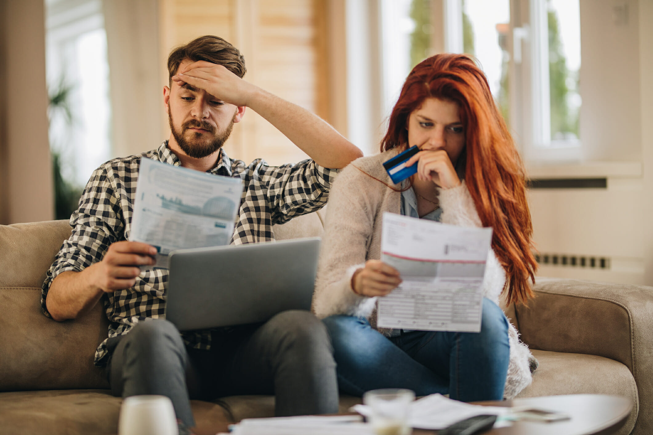 Couple trying to figure out how they're going to pay for their upcoming vacation