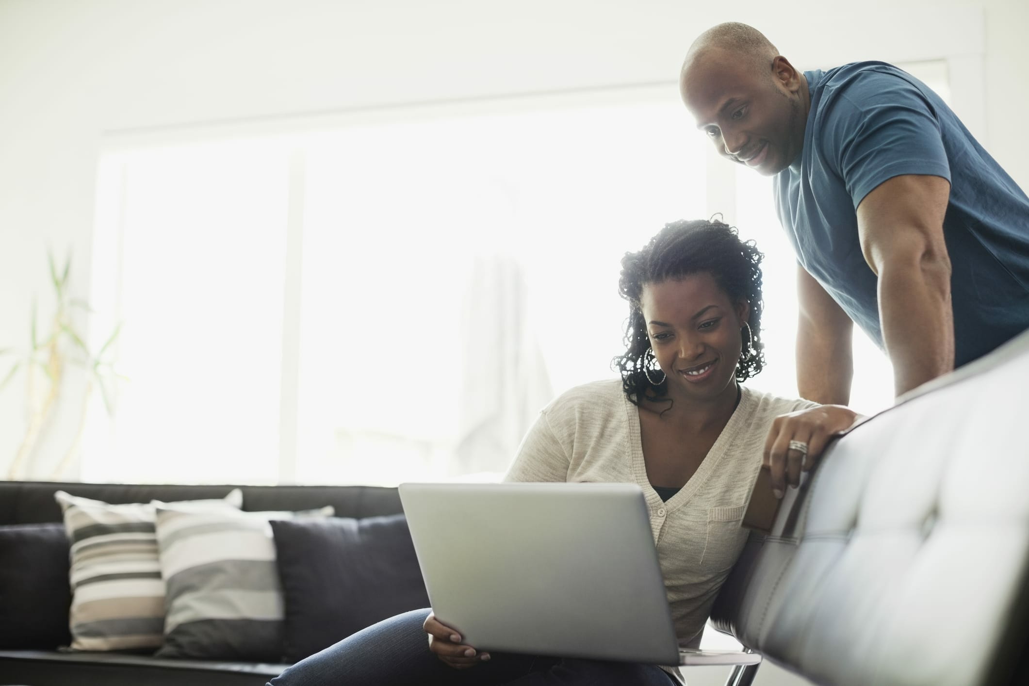 Couple looking over their balance transfer details