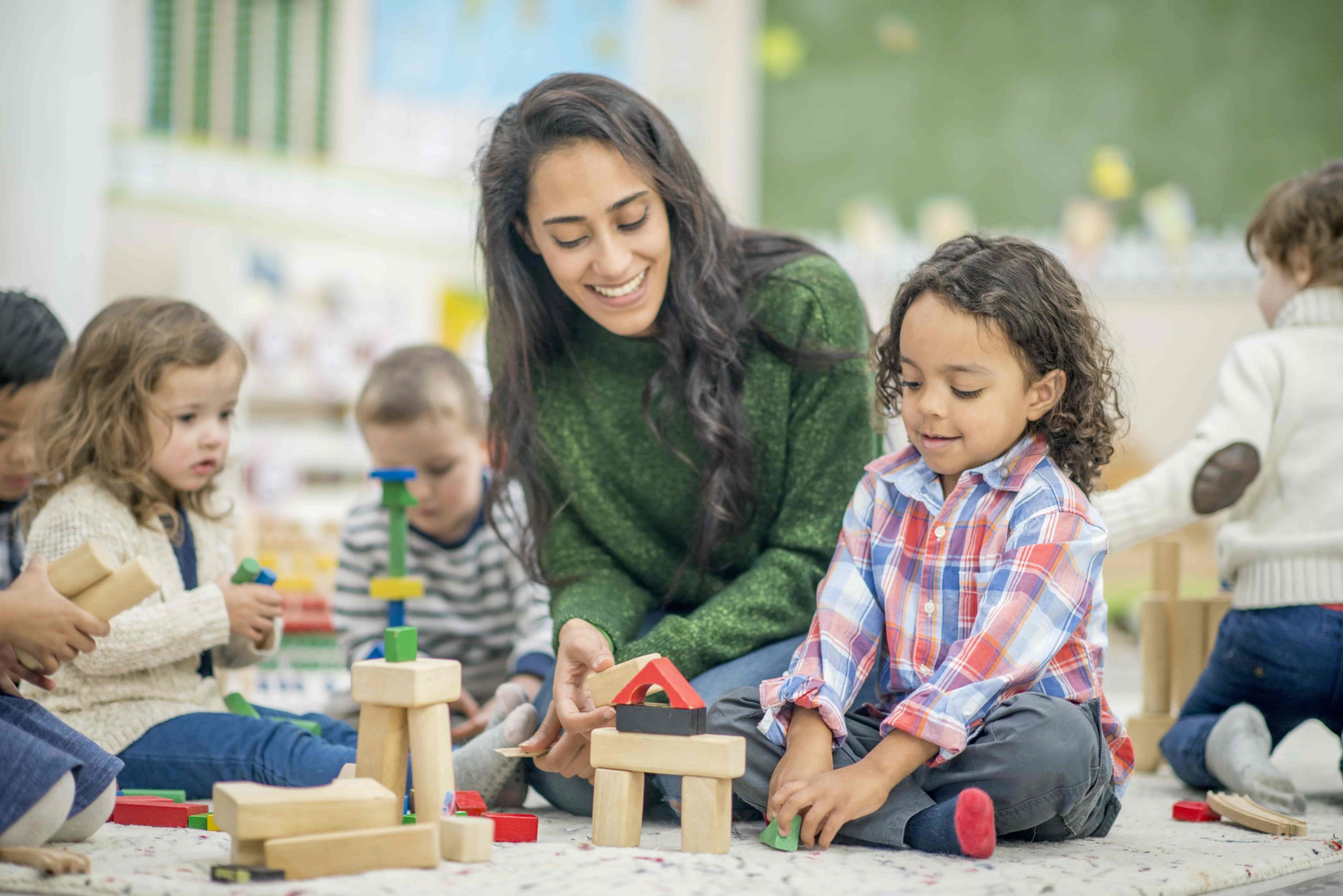 daycare with teacher and kids