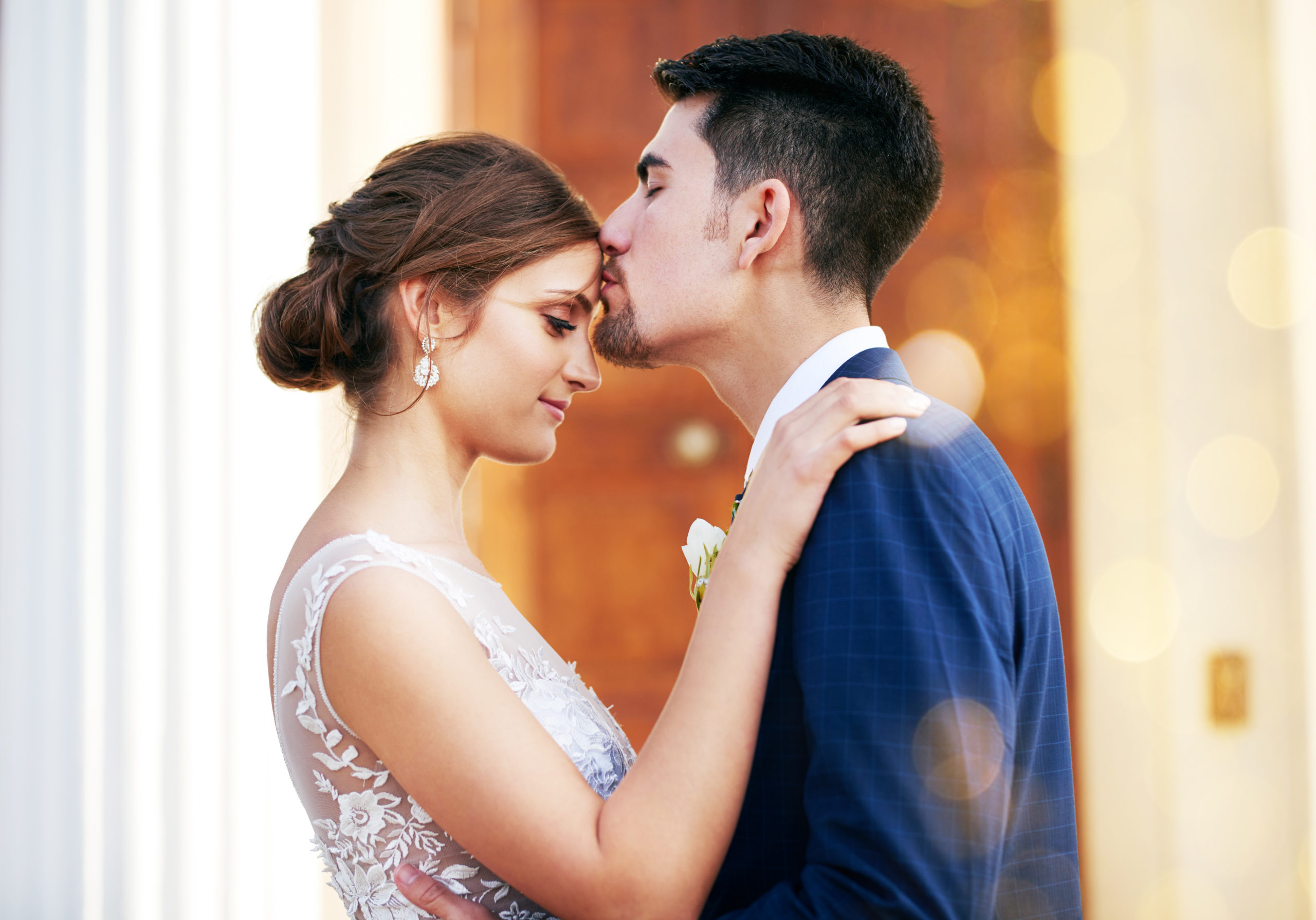 Shot of a happy young couple sharing an affectionate moment after their courthouse wedding