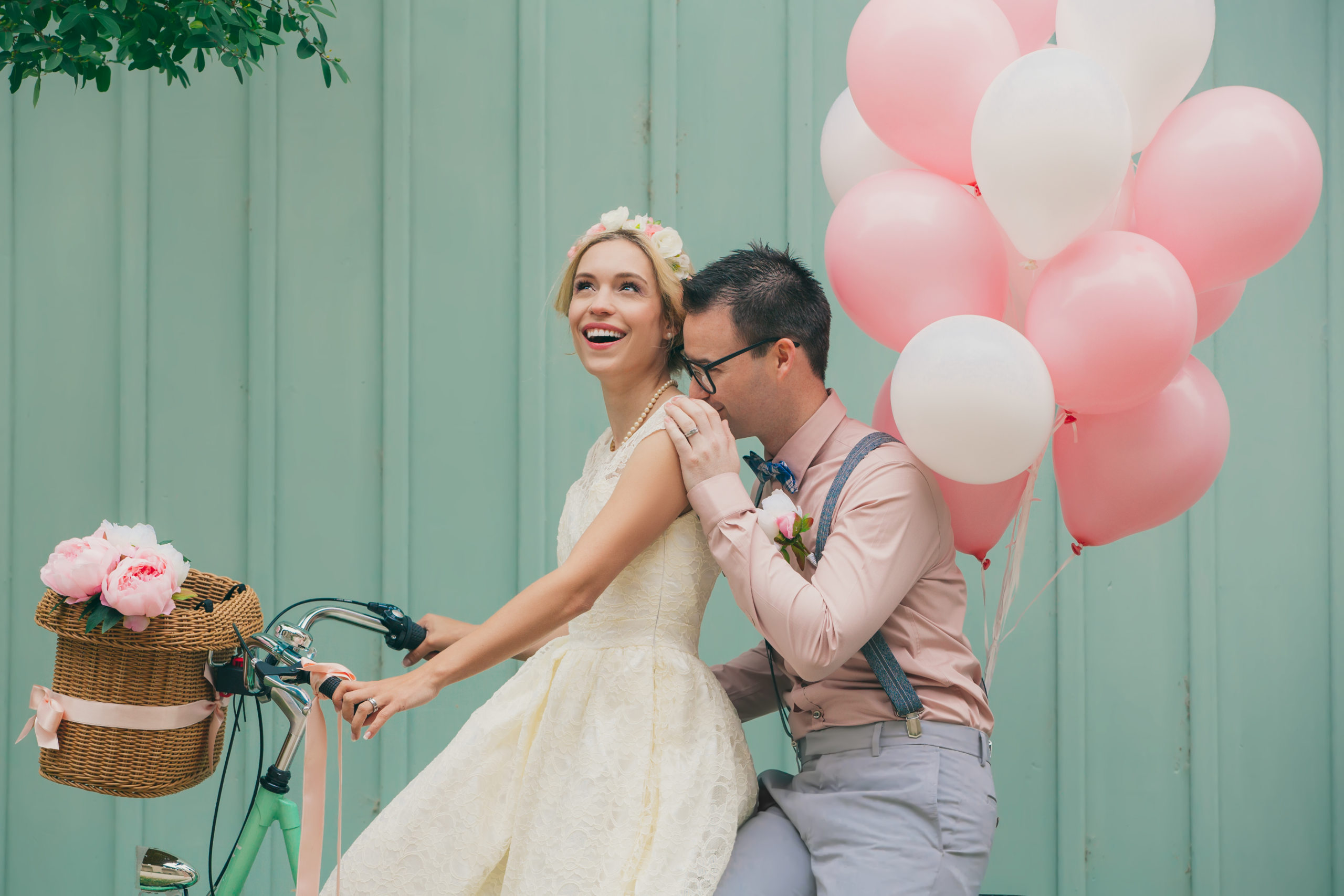 A happy couple excited about all the money they saved on their wedding.