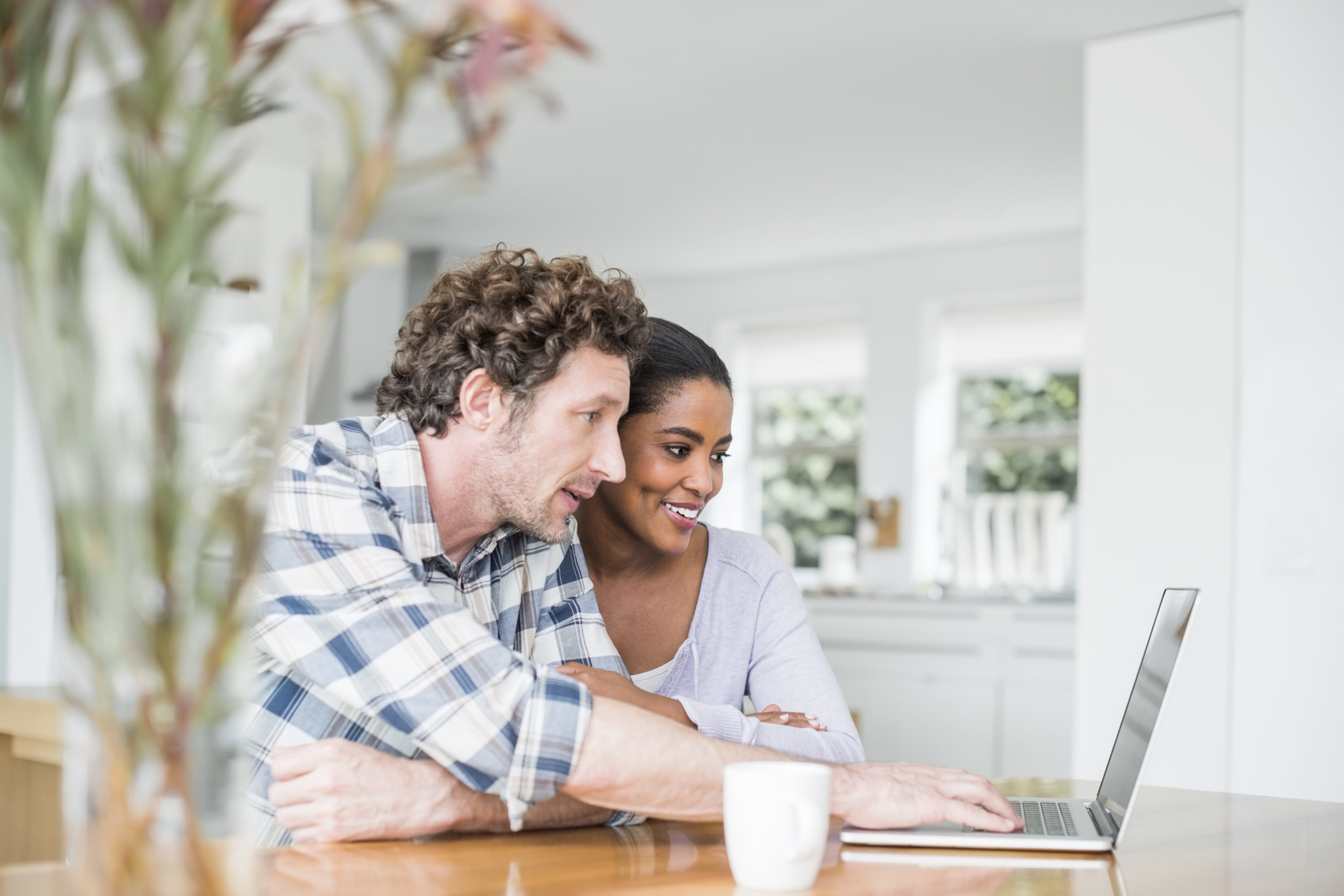 Couple looking at mortgage offers
