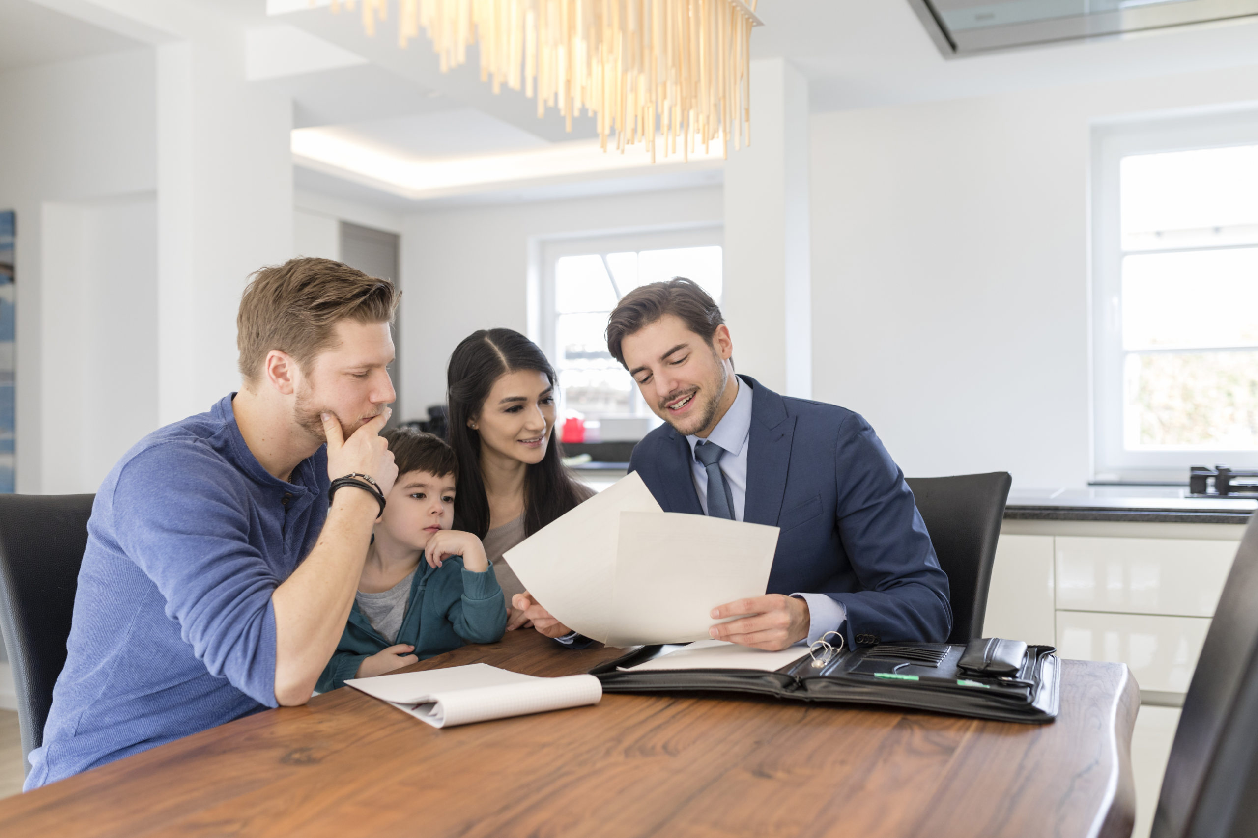 Couple looking into PMI insurance