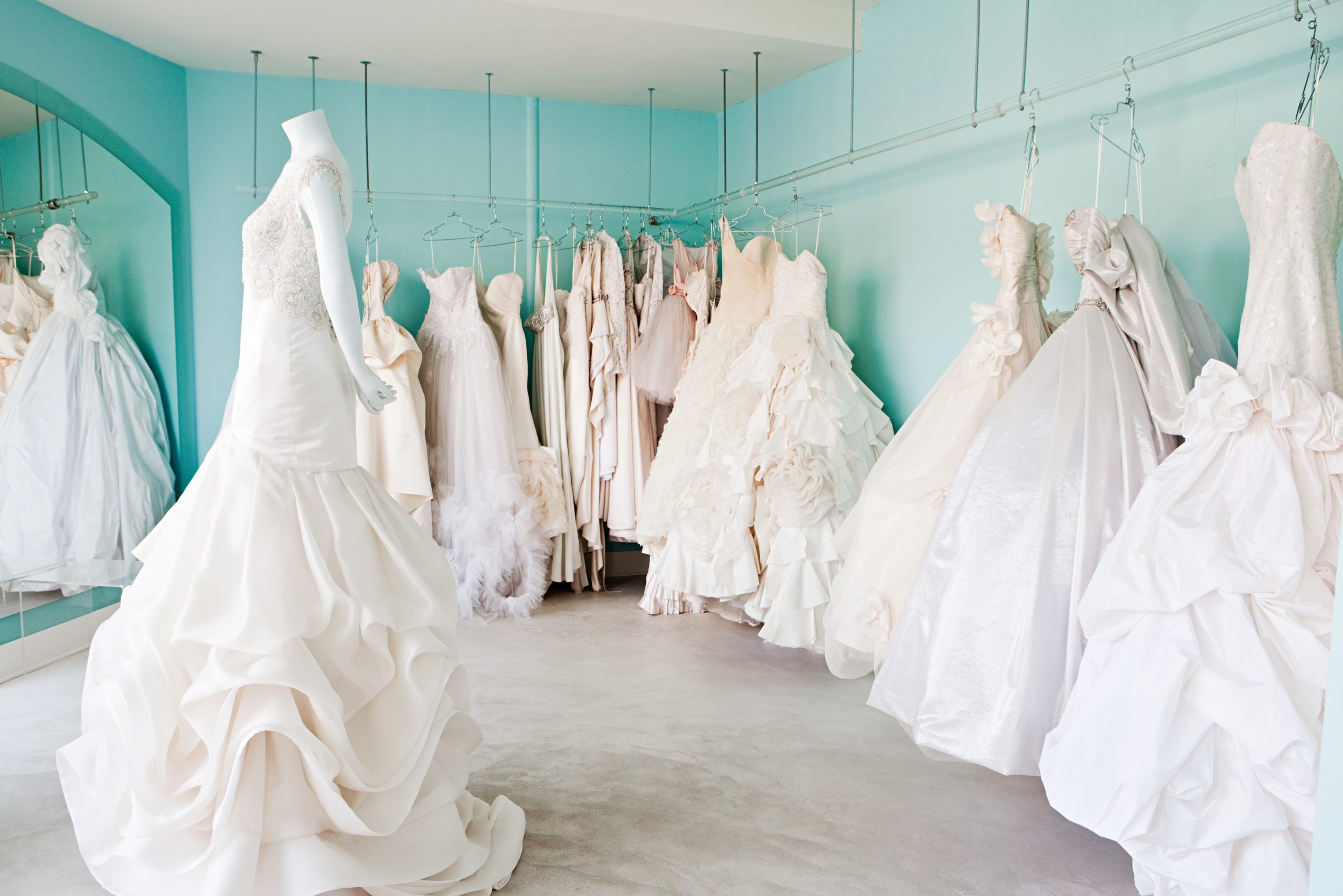 Selection of wedding dresses in boutique