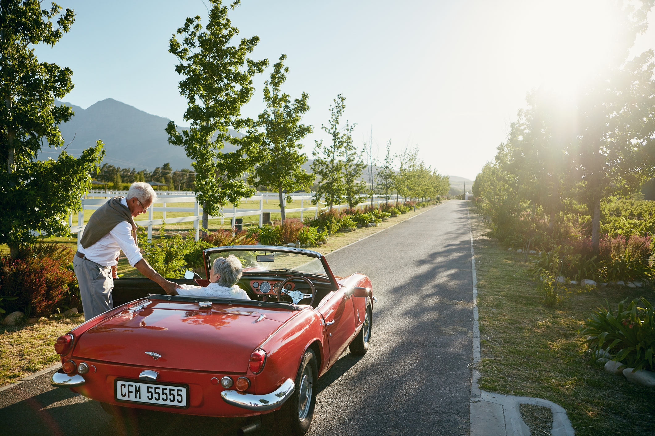 senior couple who knows the truth about the red car auto insurance myth